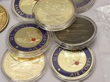 a lot of coins that are on a table