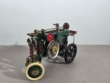 a model of a tractor that is sitting on a table