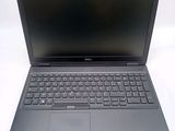 the dell laptop is open and ready to be used