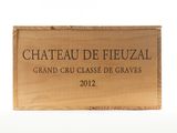 wooden box with a sign that says chateau de fuzall grand cru classe de graves 2012