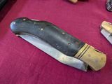 a knife that is laying on top of a table