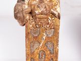 a statue of a man with a lion head on it ' s head
