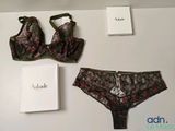 an image of a bra and panties are on a table