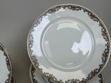 three plates that are stacked on top of each other