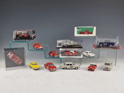 a lot of toy cars that are in a display case