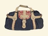 an image of a purse with a red and blue pattern on it