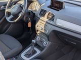 a dashboard of a car with a steering wheel and dashboard controls