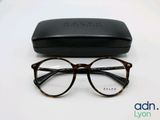 a close up of a pair of glasses on a table
