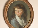 portrait of a young woman in a blue dress with a white scarf