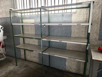 a shelf that has many shelves on it in a room