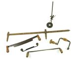 a lot of tools that are sitting on a white surface