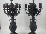 pair of antique cast iron candelabs with flowers and leaves