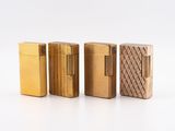 four different types of lighters are lined up on a white surface