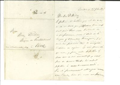 an old document with writing on it sitting on top of a table