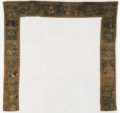 an old piece of cloth with a design on it