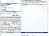 a close up of a document with a picture of a person on it