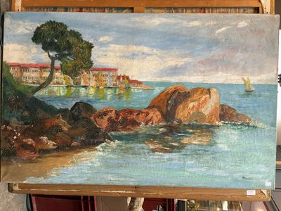 un tableau représentant une scène de plage, posé sur un chevalet