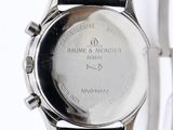 an image of a close up of a watch on a white surface