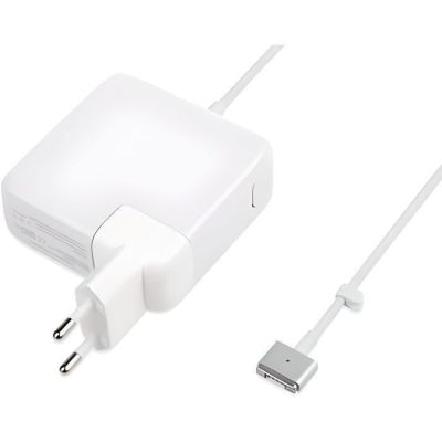 an image of a white charger and a cable connected to a laptop