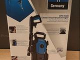 packaging of a blue and black electric pressurer sitting on a table