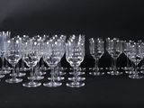 a group of empty wine glasses on a black background