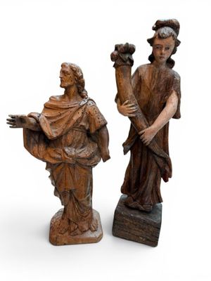 statue of a man and a woman holding flowers on a white background