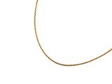 a close up of a gold chain on a white background
