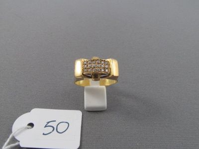 une photo d'une bague en or et diamants avec une étiquette de prix