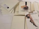 a lot of books that are on a white table