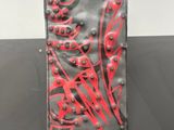 a black and red book sitting on a table