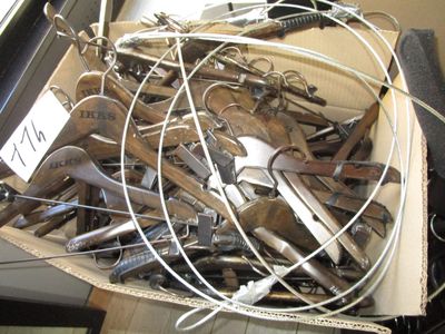 a box full of old and rusty tools on a table
