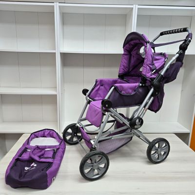 a purple stroller and a purple bag on a table