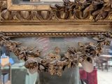 a woman taking a picture of herself in a mirror