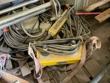 a pile of wires and tools on the floor