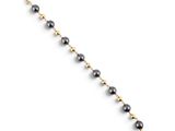 un bracelet en perles noires et dorées sur fond blanc