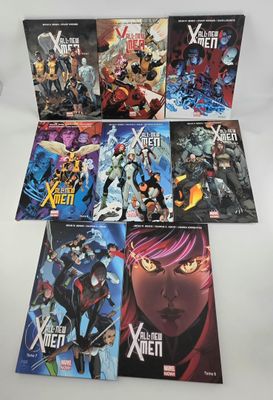 the x - men comic books are lined up on a table