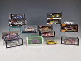 many different models of cars in a display case