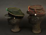 two hats that are sitting on top of a head