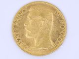 an image of a gold coin with a woman ' s face on it