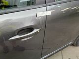 a car that has a sticker on the side of it