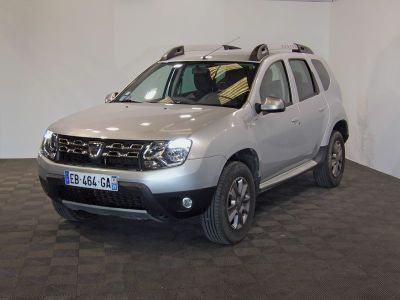 a picture of a silver dacia parked in a showroom