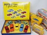 a box of assorted toy cars and a boxed box of boxed toys