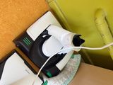 someone is using a hair dryer to dry their hair in the bathroom