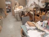 a long table with papers on it in a room