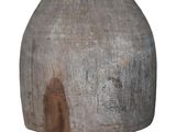 a large vase that is sitting on a white surface