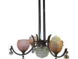 an image of a chandelier with a glass shade hanging from it