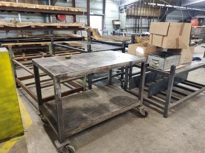 an image of a large industrial work table in a warehouse