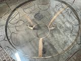 a table with a clock on it in a room