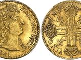 a gold coin with a cross on the front and a crown on the back