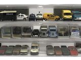 a display case with a lot of toy cars in it